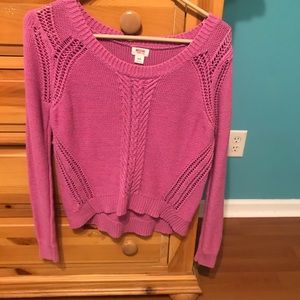 Magenta sweater with stylish hole detailing